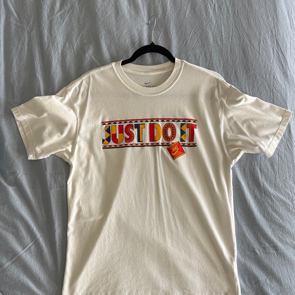 Nike Cream T-Shirt with Vibrant Graphic